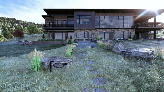 FourBarRanches Corbly Gulch, Belgrade, MT 59714 - rear view of property with a balcony and an attached garage