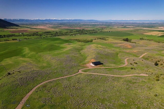 FourBarRanches Corbly Gulch, Belgrade, MT 59714 - aerial overview of property's location featuring a mountainous background