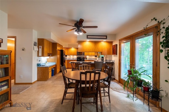 400 E 9th Ave, Big Timber, MT 59011 - dining room featuring a ceiling fan and baseboards