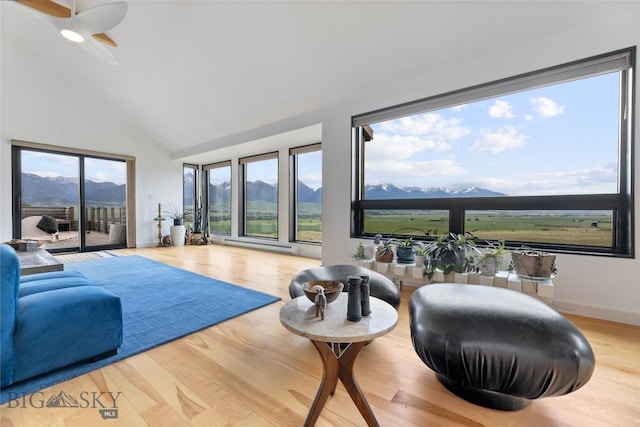 145 Spring Creek Hills Rd, Livingston, MT 59047 - living room featuring high vaulted ceiling, a mountain view, and healthy amount of natural light