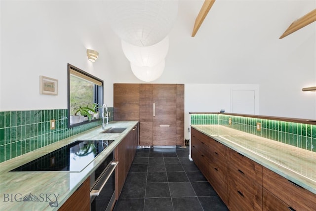 145 Spring Creek Hills Rd, Livingston, MT 59047 - bathroom with backsplash and tile patterned floors