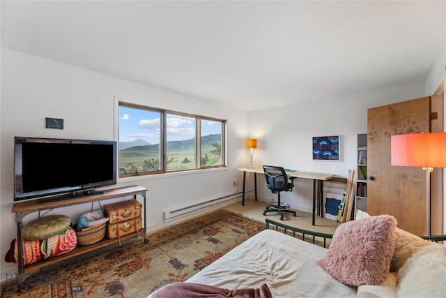 145 Spring Creek Hills Rd, Livingston, MT 59047 - bedroom featuring a baseboard heating unit and baseboards