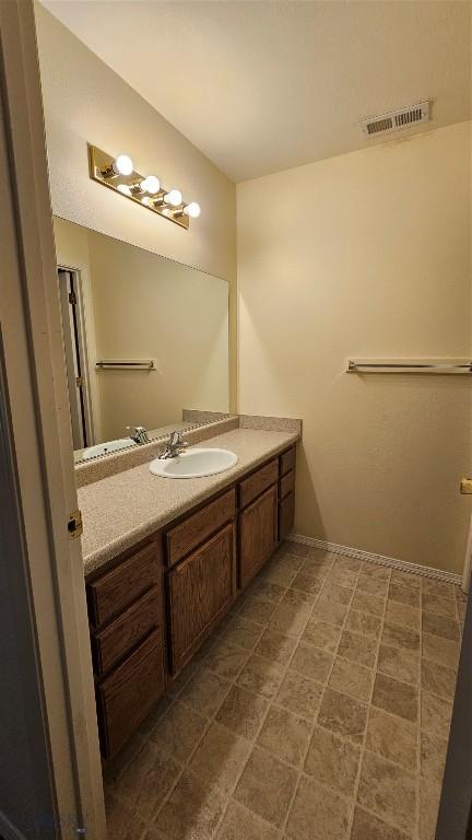 835 Forestglen Unit H, Bozeman, MT 59718 - bathroom featuring vanity and baseboards