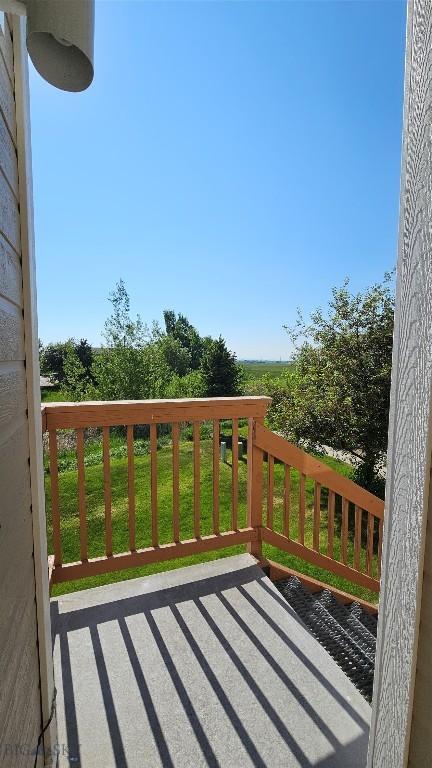 835 Forestglen Unit H, Bozeman, MT 59718 - deck with a lawn