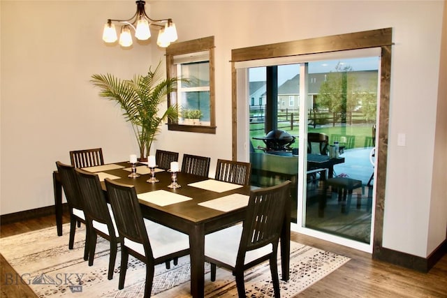 176 Travelers, Manhattan, MT 59741 - dining space featuring a chandelier and wood finished floors