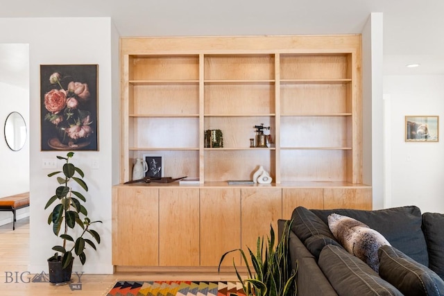 1991 Ryun Sun Way, Bozeman, MT 59718 - living room featuring built in shelves and wood finished floors