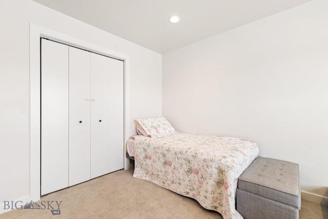 1991 Ryun Sun Way, Bozeman, MT 59718 - bedroom with light colored carpet, a closet, and recessed lighting