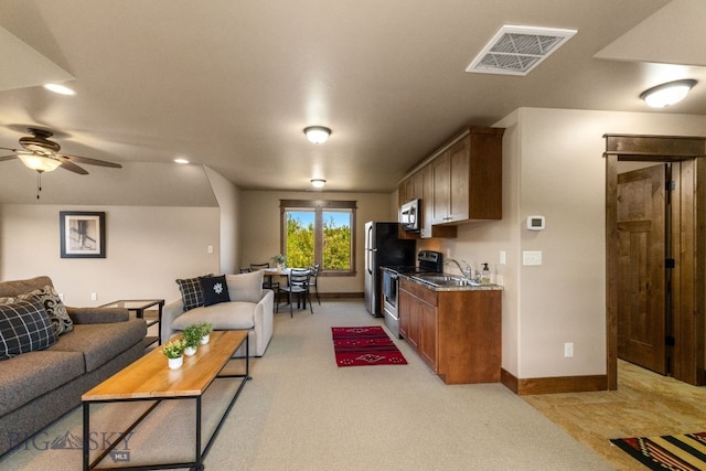 2497 Northview, Bozeman, MT 59715 - living room with light colored carpet and a ceiling fan