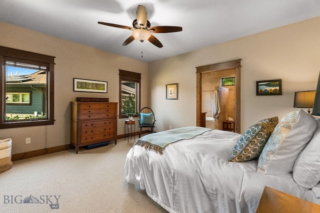2497 Northview, Bozeman, MT 59715 - carpeted bedroom with ceiling fan and ensuite bathroom