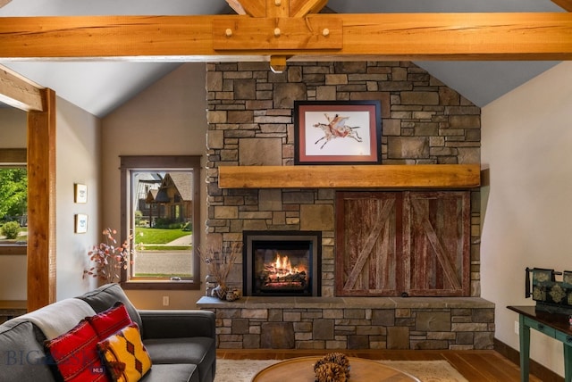 2497 Northview, Bozeman, MT 59715 - living area featuring vaulted ceiling, wood finished floors, and a fireplace