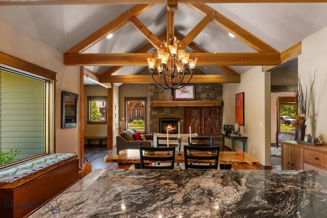 2497 Northview, Bozeman, MT 59715 - sitting room featuring beamed ceiling, a chandelier, recessed lighting, and a stone fireplace