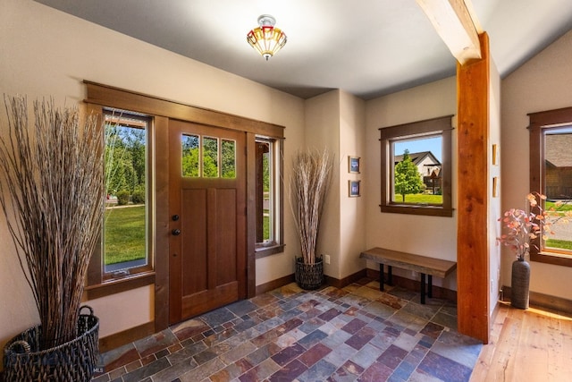 2497 Northview, Bozeman, MT 59715 - entryway with baseboards and stone tile flooring