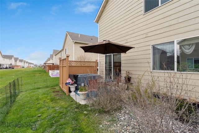 1030 N River Rock St, Belgrade, MT 59714 - view of property exterior featuring a fenced backyard and a residential view