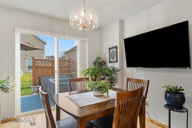 1030 N River Rock St, Belgrade, MT 59714 - dining space with healthy amount of natural light and a chandelier