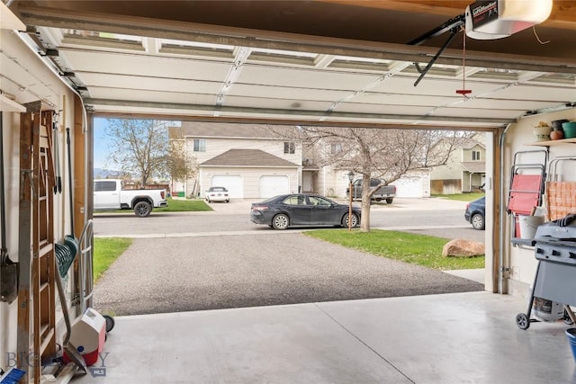 1030 N River Rock St, Belgrade, MT 59714 - garage featuring a garage door opener