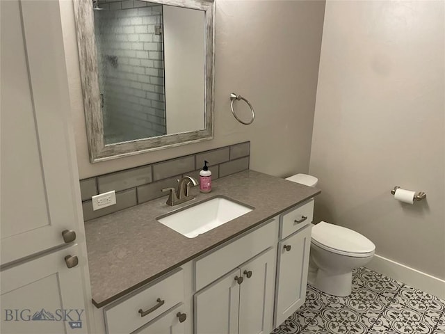 1792 Windrow Dr, Bozeman, MT 59718 - bathroom with tile patterned floors, vanity, and decorative backsplash