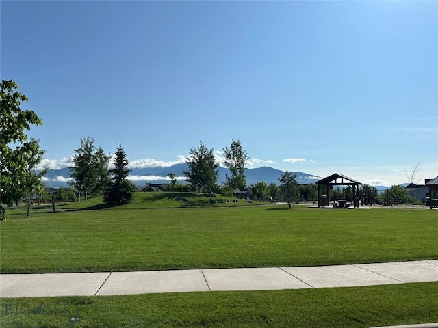 1792 Windrow Dr, Bozeman, MT 59718 - view of property's community with a gazebo, a lawn, and a mountain view