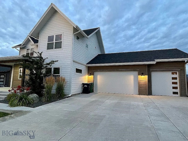 1792 Windrow Dr, Bozeman, MT 59718 - view of front of property featuring driveway and an attached garage
