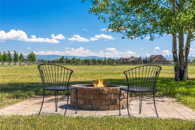 164 Wapiti Way, Bozeman, MT 59718 - view of patio featuring an outdoor fire pit and a mountain view