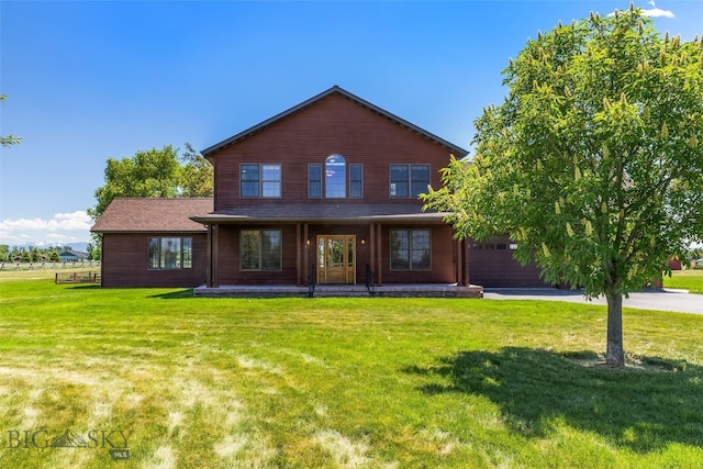 164 Wapiti Way, Bozeman, MT 59718 - back of property with a lawn and covered porch