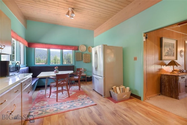 100 Nez Perce Rd, Butte, MT 59701 - dining room with light wood finished floors, wood ceiling, and vaulted ceiling
