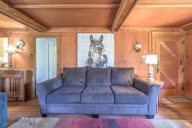 100 Nez Perce Rd, Butte, MT 59701 - living area featuring beam ceiling, wood-type flooring, and wood walls