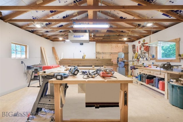 100 Nez Perce Rd, Butte, MT 59701 - miscellaneous room with a workshop area, lofted ceiling, and a heating unit