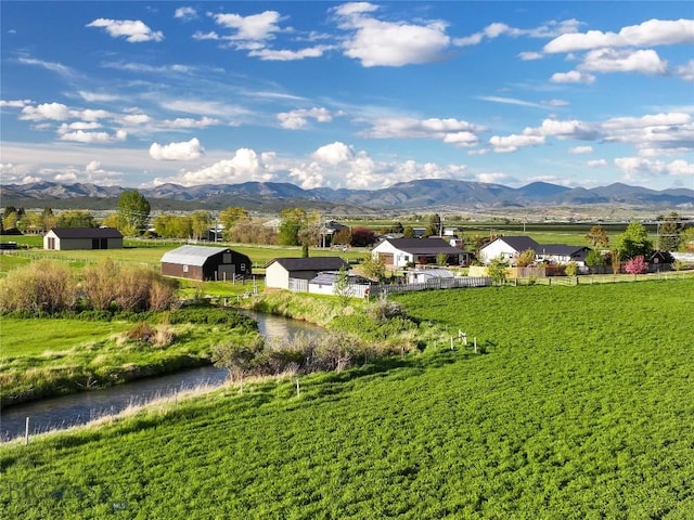 3950 Floweree, Helena, MT 59602 - view of property's community featuring a mountain view and a storage shed