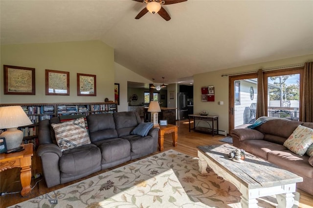 3950 Floweree, Helena, MT 59602 - living area with ceiling fan, light wood-style floors, and vaulted ceiling