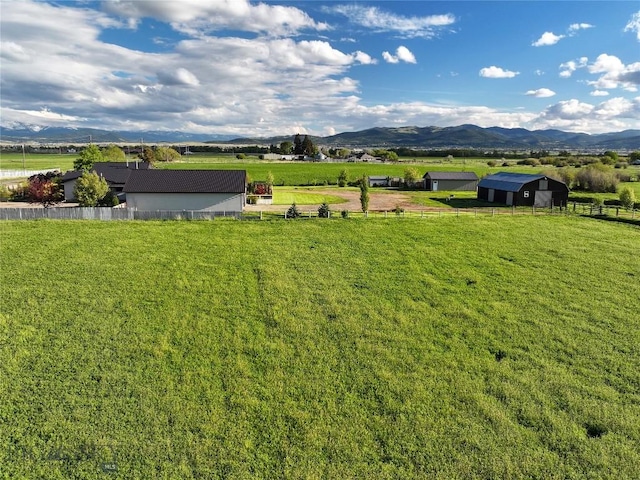 3950 Floweree, Helena, MT 59602 - view of yard with a view of rural / pastoral area, a mountain view, and an outdoor structure