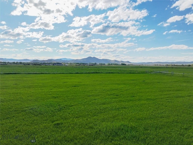 3950 Floweree, Helena, MT 59602 - view of grassy yard with a rural view and a mountain view