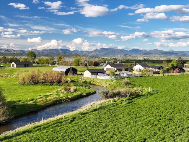 3950 Floweree, Helena, MT 59602 - view of home's community with a mountain view and a storage unit