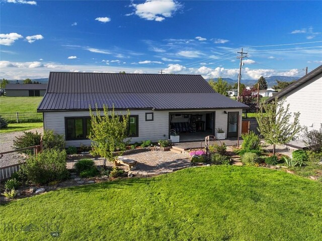 3950 Floweree, Helena, MT 59602 - rear view of property with a metal roof