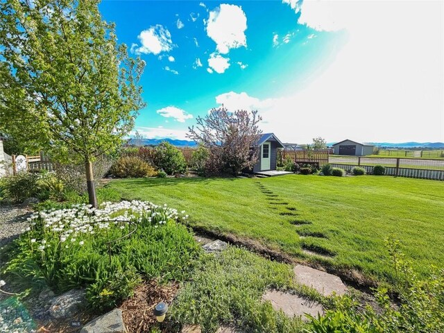 3950 Floweree, Helena, MT 59602 - fenced backyard with an outbuilding