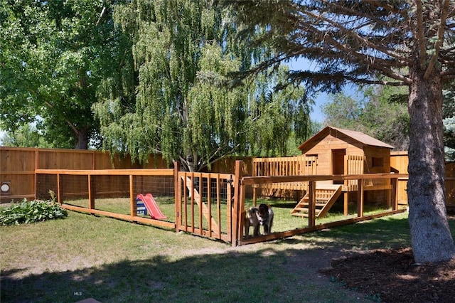 219 W Adams, Three Forks, MT 59752 - fenced backyard featuring a playground