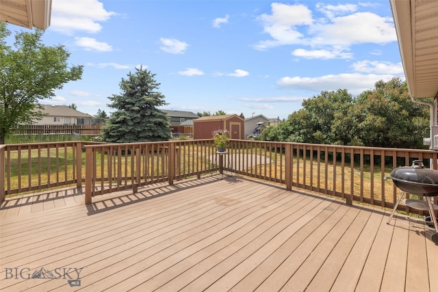 1002 E Northern Pacific Ave, Belgrade, MT 59714 - wooden terrace with a storage shed, a residential view, and grilling area