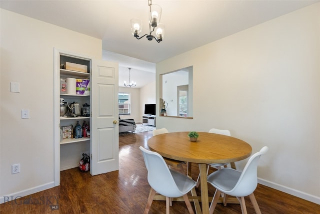 1002 E Northern Pacific Ave, Belgrade, MT 59714 - dining area with a chandelier and wood finished floors