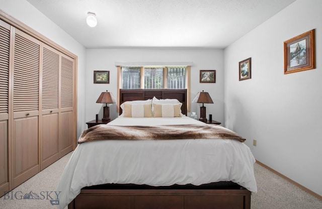 8A Gallatin Dr, Bozeman, MT 59718 - carpeted bedroom featuring a closet and baseboards