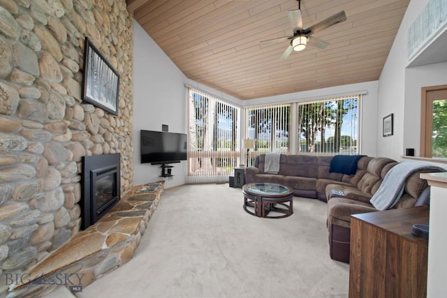8A Gallatin Dr, Bozeman, MT 59718 - living area featuring carpet, a ceiling fan, lofted ceiling, wood ceiling, and a fireplace