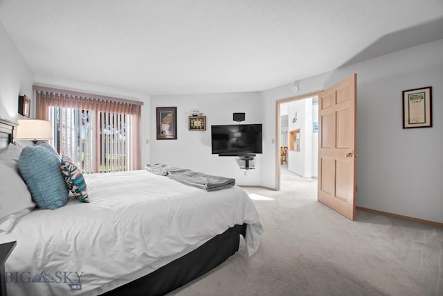 8A Gallatin Dr, Bozeman, MT 59718 - bedroom featuring light carpet and baseboards
