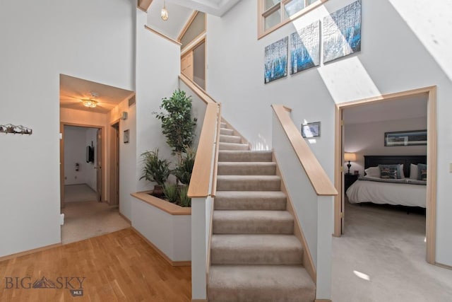 8A Gallatin Dr, Bozeman, MT 59718 - stairs featuring a high ceiling and wood finished floors