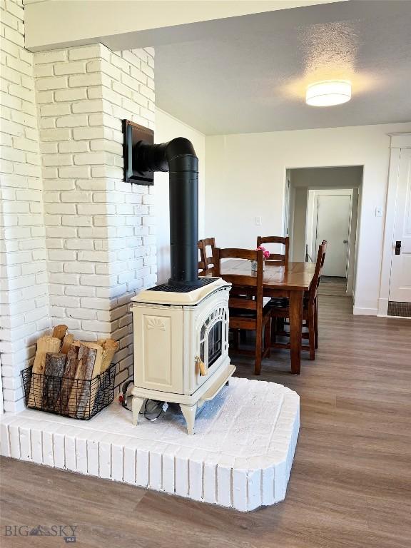 3575 Stucky Rd, Bozeman, MT 59715 - detailed view of wood finished floors and a wood stove