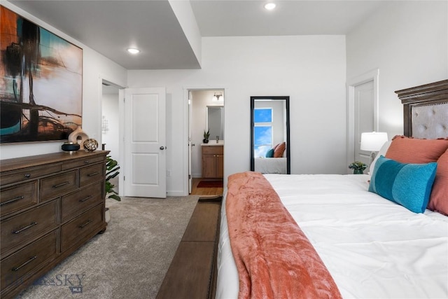 608 Mira Way Unit A, Belgrade, MT 59714 - bedroom with ensuite bathroom and recessed lighting