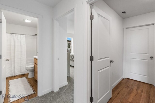 608 Mira Way Unit A, Belgrade, MT 59714 - corridor with baseboards and wood finished floors