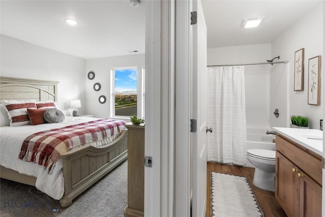 608 Mira Way Unit A, Belgrade, MT 59714 - bedroom featuring dark wood finished floors