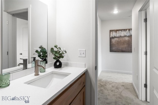 608 Mira Way Unit A, Belgrade, MT 59714 - bathroom featuring vanity and baseboards