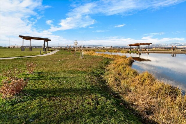 608 Mira Way Unit A, Belgrade, MT 59714 - surrounding community with a yard and a water view