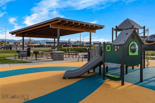 608 Mira Way Unit A, Belgrade, MT 59714 - community jungle gym featuring a mountain view