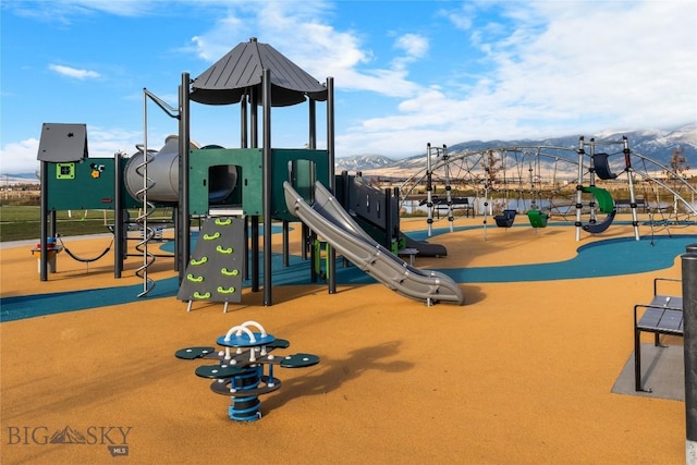 608 Mira Way Unit A, Belgrade, MT 59714 - community jungle gym featuring a mountain view