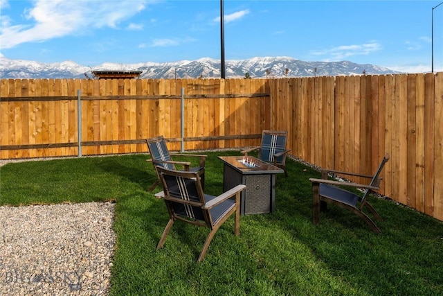 608 Mira Way Unit A, Belgrade, MT 59714 - view of yard with a mountain view and an outdoor fire pit